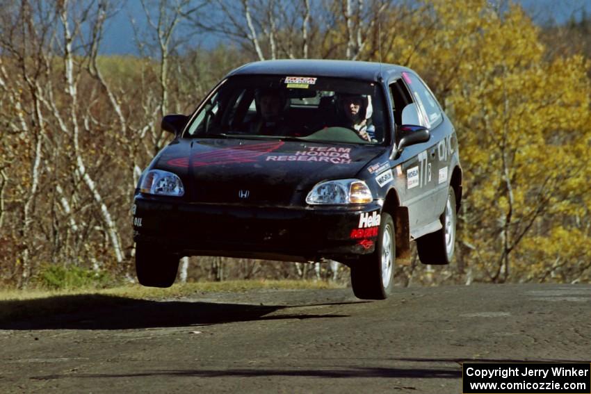 Bryan Hourt / Pete Cardimen Honda Civic catches nice air at the final yump on SS13, Brockway I.