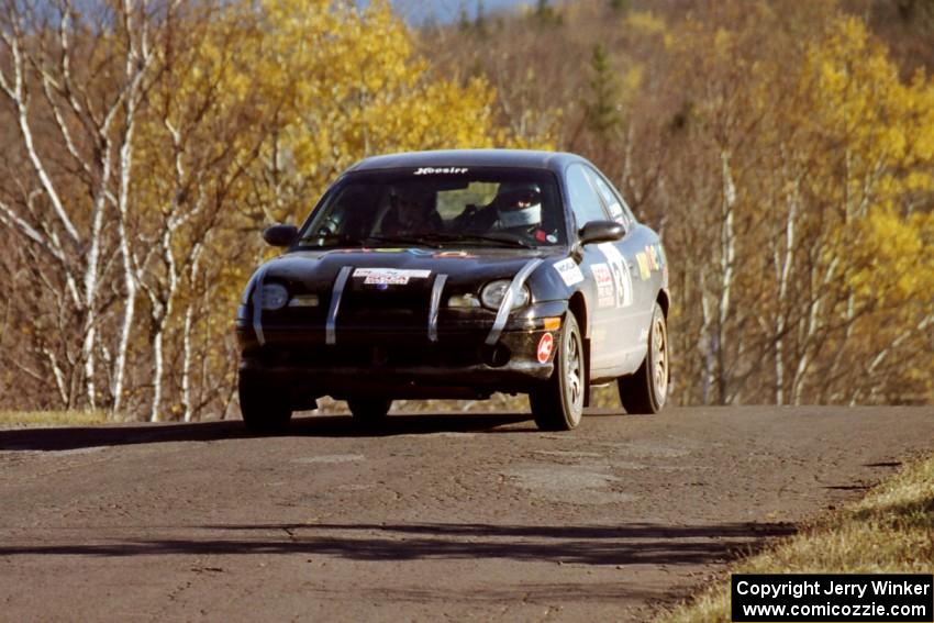 Evan Moen / Ron Moen Plymouth Neon at speed on SS13, Brockway I.