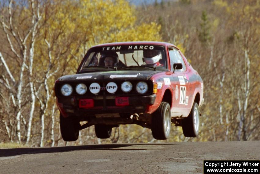 Scott Harvey, Jr. / David Watts Dodge Colt catches nice air at the final yump on SS13, Brockway I.