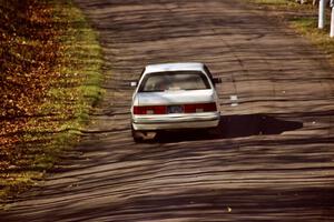 Henry Krolikowski / Cindy Krolikowski Dodge Shadow at speed on SS14, Brockway II.