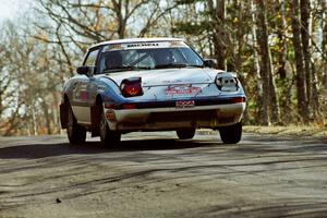 Mike Hurst / Rob Bohn Mazda RX-7 at speed on SS14, Brockway II.