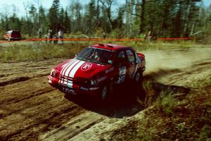 Mike Whitman / Paula Gibeault Ford Sierra Cosworth at speed through the spectator corner of SS15, Gratiot Lake II.