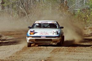 Mike Hurst / Rob Bohn Mazda RX-7 at speed near the finish of SS15, Gratiot Lake II.