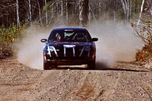 Evan Moen / Ron Moen Plymouth Neon at speed near the finish of SS15, Gratiot Lake II.