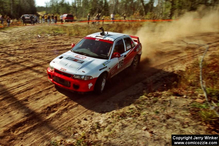 David Summerbell / Michael Fennell Mitsubishi Lancer Evo II at speed through the spectator corner of SS15, Gratiot Lake II.