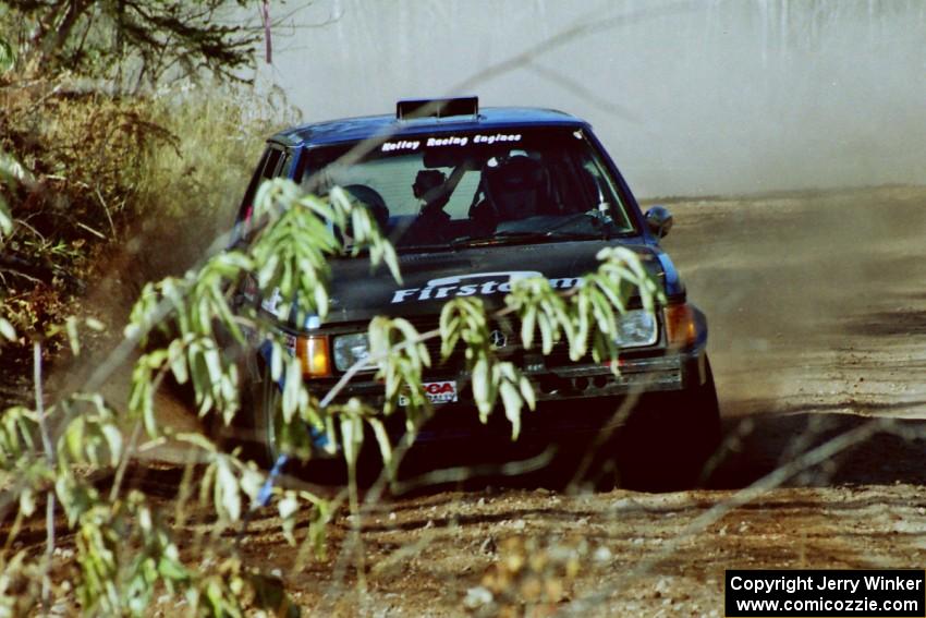 Mark Utecht / Brenda Corneliusen Dodge Omni GLH-Turbo at speed near the finish of SS15, Gratiot Lake II.