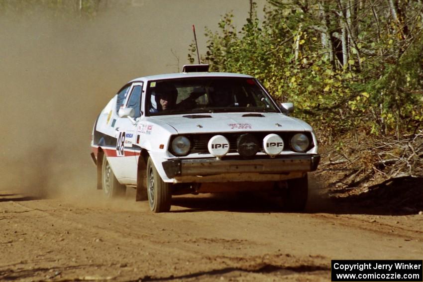 Jeremy Butts / Peter Jacobs Plymouth Arrow at speed near the finish of SS15, Gratiot Lake II.