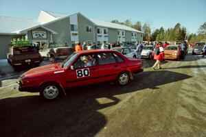 Jon Kemp / Brian Maxwell Audi 4000 Quattro and Gail Truess / Pattie Hughes Mazda 323GTX await tech at the A-Win Sands Motel.