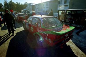 Carlos Arrieta, Sr. / Dick Casey Audi 4000 Quattro prepares for tech inspection in front of the A-Win Sands Motel.