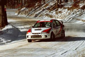 Garen Shrader / Doc Schrader get used to the new Mitsubishi Lancer Evo IV seen here at the SS1 spectator location.