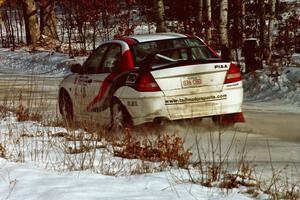 Garen Shrader / Doc Schrader ignore the set speed limit in their Mitsubishi Lancer Evo IV just after the SS1 spectator location.