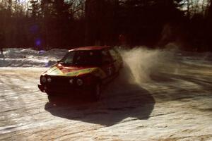 Karl Scheible / Gail McGuire drift their VW GTI perfectly through the SS1 spectator location.