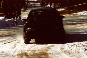 Evan Moen / Ron Moen Plymouth Neon ACR fights for grip at the SS1 spectator location.