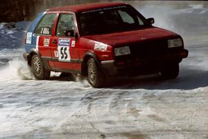 Brian Vinson / Richard Beels VW GTI drifts wide at the spectator corner on SS1.