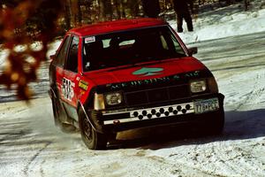 Jim Buchwitz / C.O. Rudstrom drift through a left-hander at the SS1 spectator location in their Mercury Lynx.