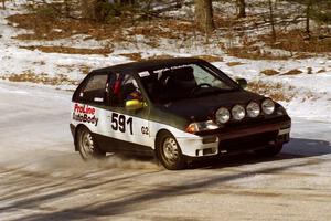 Dave Cizmas, Jr. / Dave Cizmas, Sr. Suzuki Swift at the spectator corner on SS1.