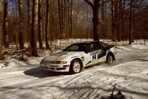 Brian Pepp / Jerry Stang at speed down a straight on SS3 in their Eagle Talon.