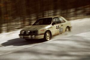 Henry Krolikowski / Cindy Krolikowski at speed in their Dodge Shadow on SS3.