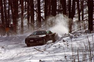 The Eagle Talon of Celsus Donnelly / Brendan Lawless taps the outside of a bank on SS3.