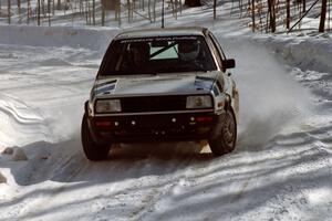 Eric Burmeister / Mark Buskirk VW GTI drifts through a right-hander on SS3.