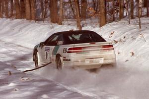 Rob Bohn / Todd Houtz Mitsubishi Eclipse on a straightaway at speed on SS3.