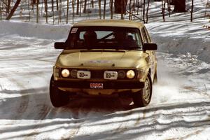 Tim Winker / Brenda Corneliusen drift through a right-hander on SS3 in their SAAB 99.