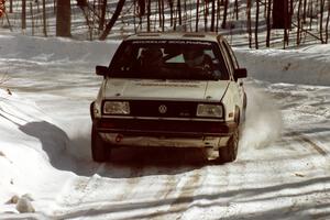 Art Burmeister / Randy Moore VW GTI take in easy on a slippery right-hand corner on SS3.