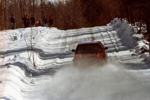 Karl Scheible / Gail McGuire head uphill toward spectators on the last stage before the lunch break in their VW GTI.