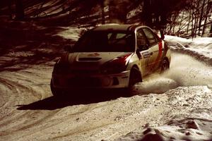 Garen Shrader / Doc Schrader try to get back up toward the front in their Mitsubishi Lancer Evo IV.