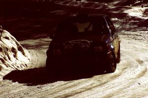 Mark Utecht / Diane Sargent Dodge Omni GLH takes a smooth line through a slippery corner on the stage after the lunch break.