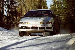 Brian Pepp / Jerry Stang speed over a blind crest in their Eagle Talon before sunset.