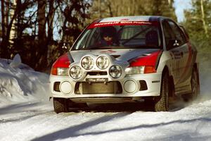 Garen Shrader / Doc Shrader at speed before sundown in their Mitsubishi Lancer Evo IV.