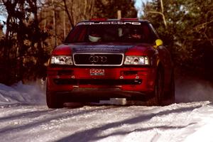 John Rek / Clark Bond Audi Quattro S2 at speed over a crest before sunset.