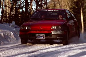 Charles Sherrill / Mark Rea made repairs to damage on their Honda CRX after going off earlier in the event.