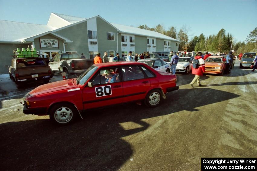 Jon Kemp / Brian Maxwell Audi 4000 Quattro and Gail Truess / Pattie Hughes Mazda 323GTX await tech at the A-Win Sands Motel.