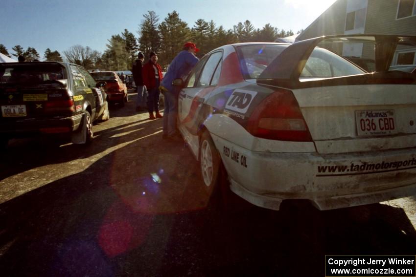 Tom Ottey / Pam McGarvey Mazda 323GTX and Garen Shrader / Doc Schrader Mitsubishi Lancer Evo IV await tech.