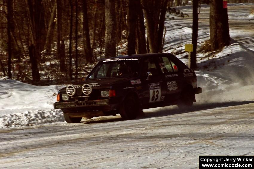 Mark Utecht / Diane Sargent set up for a 90-left at the SS1 spectator corner in their Dodge Omni GLH-Turbo.