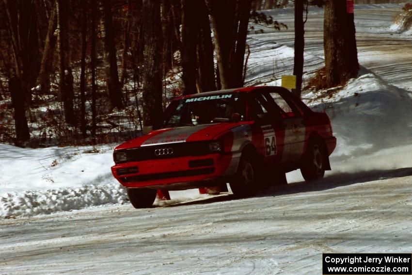 Sylvester Stepniewski / Adam Pelc Audi 4000 Quattro at speed at the SS1 spectator location.