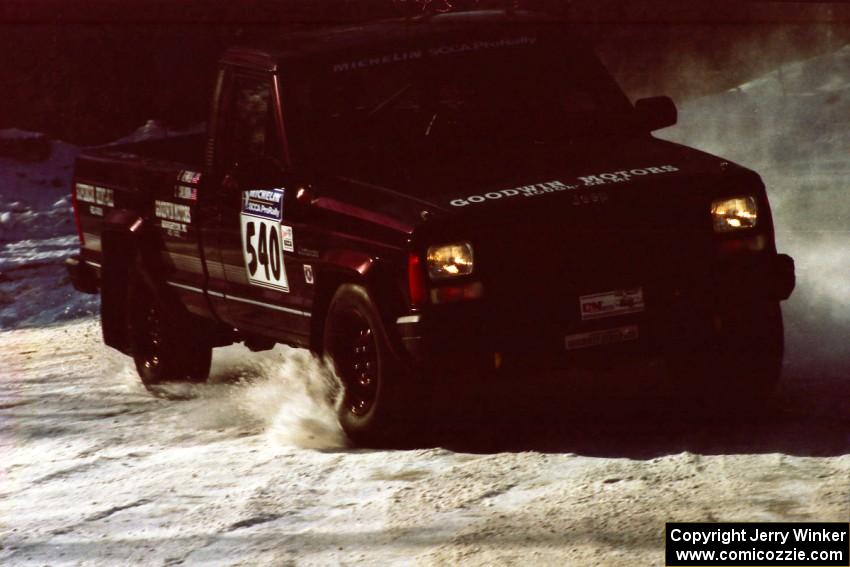 Scott Carlborn / Dale Dewald slide their Jeep Comanche wide at the SS1 spectator location.