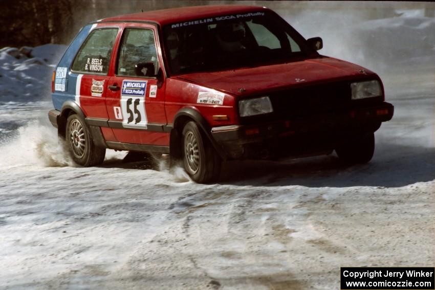 Brian Vinson / Richard Beels VW GTI drifts wide at the spectator corner on SS1.