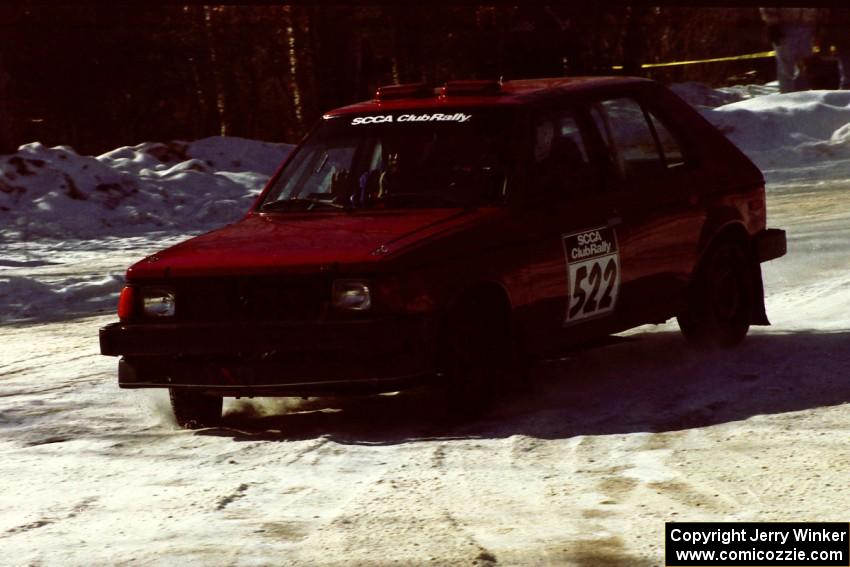 Jon Butts / Gary Butts drift wide at the spectator point on SS1 in their Dodge Omni.