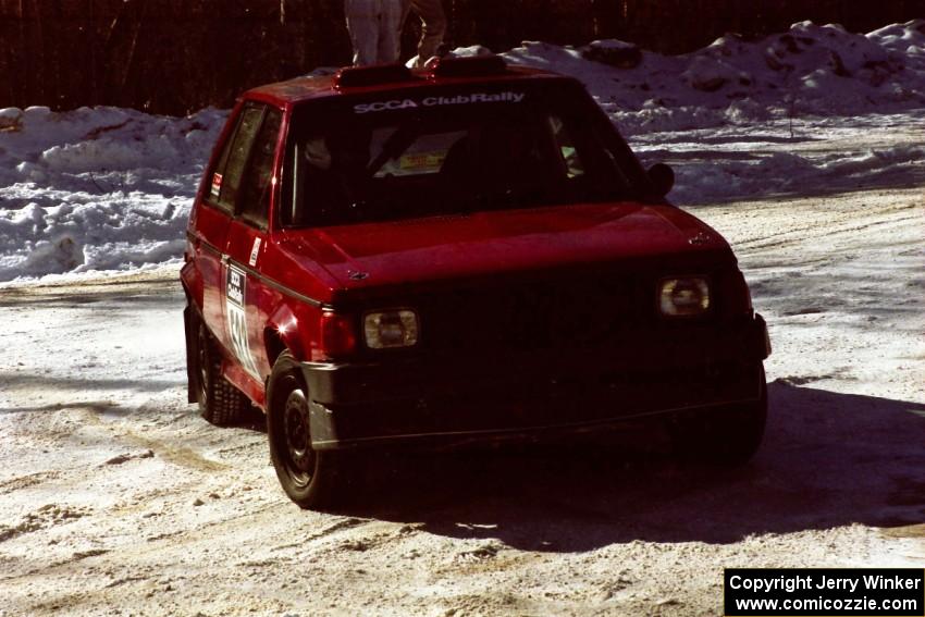 Jon Butts / Gary Butts almost tags the outside bank at the spectator point on SS1 in their Dodge Omni.