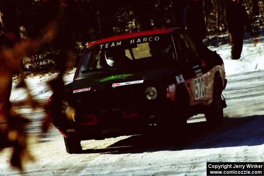 Scott Harvey, Jr. / Al Zifilippo drift their Dodge Colt GT through the spectator corner on SS1.