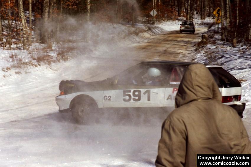 Dave Cizmas, Jr. / Dave Cizmas, Sr. spin their Suzuki Swift at the SS1 spectator location.