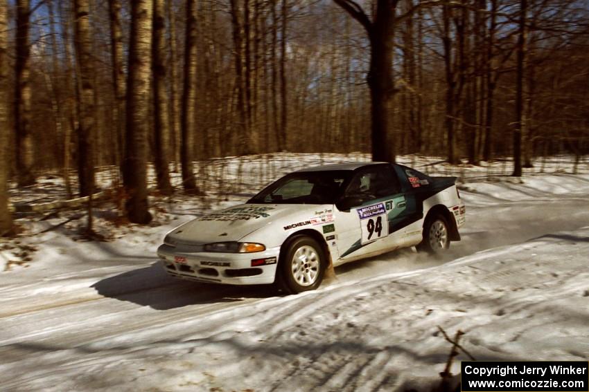 Brian Pepp / Jerry Stang at speed down a straight on SS3 in their Eagle Talon.