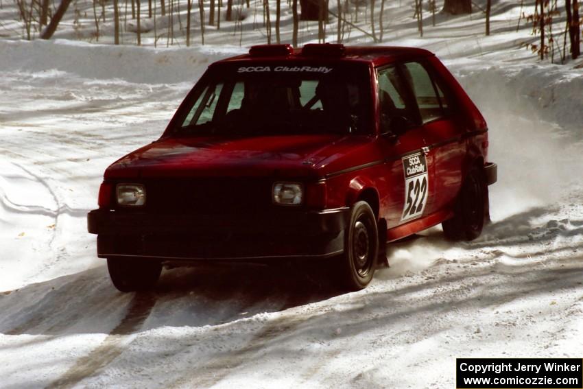 Jon Butts / Gary Butts slide through a right-hander on SS3 in their Dodge Omni.