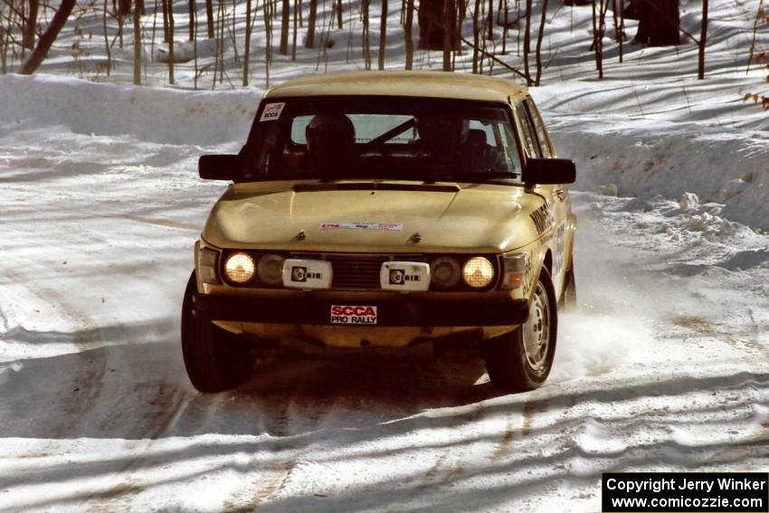 Tim Winker / Brenda Corneliusen drift through a right-hander on SS3 in their SAAB 99.