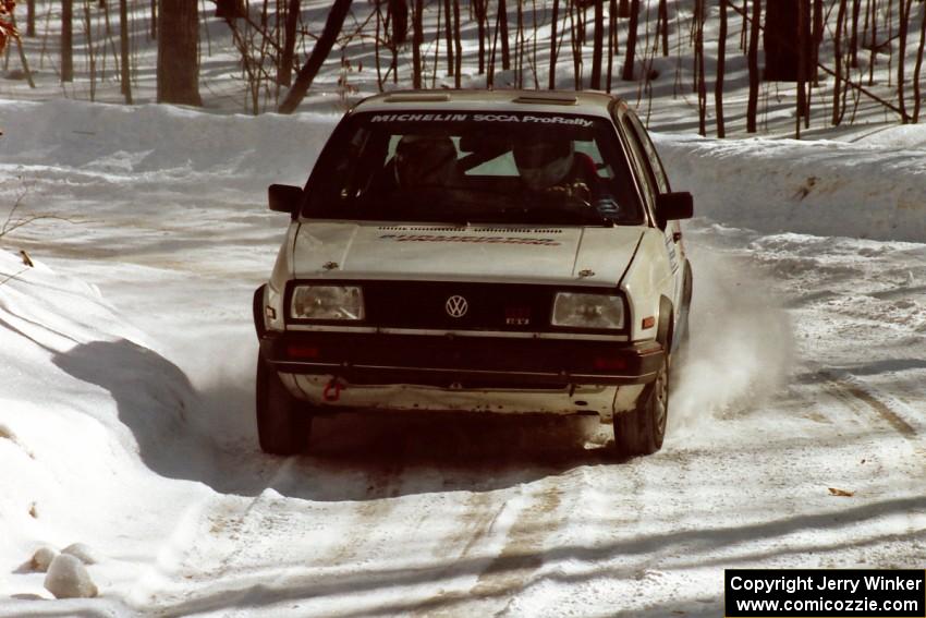 Art Burmeister / Randy Moore VW GTI take in easy on a slippery right-hand corner on SS3.