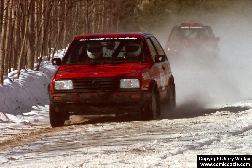 Brian Vinson / Richard Beels VW GTI presses on with a flat left-front on the stage prior to the lunch break.