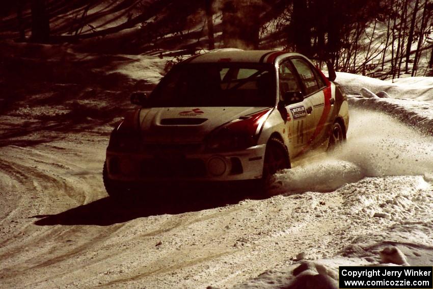 Garen Shrader / Doc Schrader try to get back up toward the front in their Mitsubishi Lancer Evo IV.